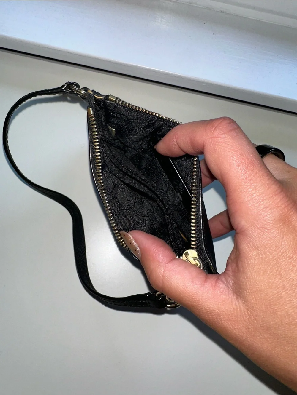 Michael Kors Black and Gold Saffiano Wristlet